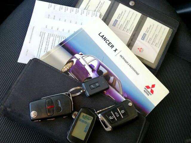 Черный Мицубиси Лансер, объемом двигателя 2 л и пробегом 196 тыс. км за 5500 $, фото 10 на Automoto.ua