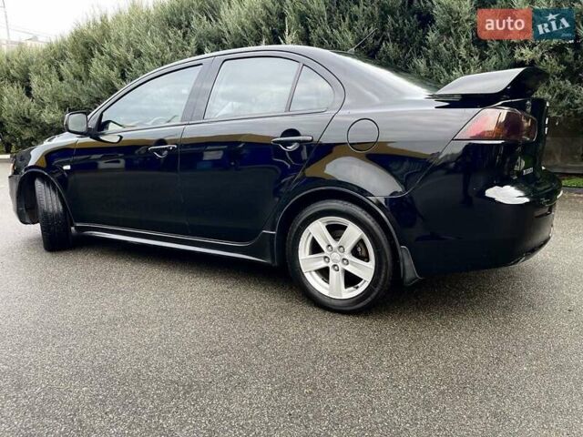 Чорний Міцубісі Lancer, об'ємом двигуна 2 л та пробігом 217 тис. км за 5600 $, фото 8 на Automoto.ua