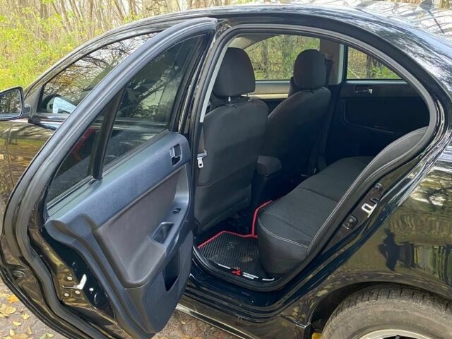 Мицубиси Лансер 2008 в Ичне на Automoto.ua Черный Мицубиси Лансер, объемом двигателя 2 л и пробегом 237 тыс. км за 7500 $, фото 4 на Automoto.ua