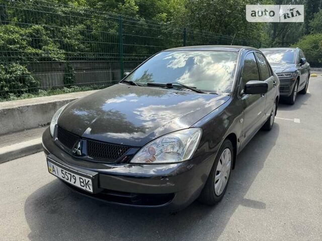 Чорний Міцубісі Lancer, об'ємом двигуна 1.6 л та пробігом 78 тис. км за 3999 $, фото 6 на Automoto.ua