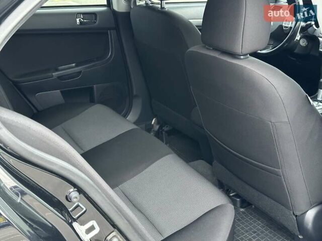 Чорний Міцубісі Lancer, об'ємом двигуна 2 л та пробігом 199 тис. км за 7900 $, фото 21 на Automoto.ua