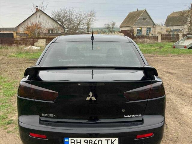 Чорний Міцубісі Lancer, об'ємом двигуна 2 л та пробігом 180 тис. км за 7500 $, фото 2 на Automoto.ua