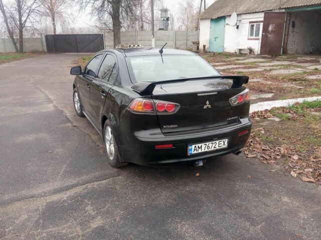 Чорний Міцубісі Lancer, об'ємом двигуна 2 л та пробігом 232 тис. км за 5000 $, фото 7 на Automoto.ua