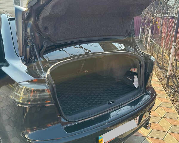 Чорний Міцубісі Lancer, об'ємом двигуна 2 л та пробігом 150 тис. км за 6500 $, фото 3 на Automoto.ua