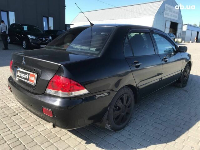 Чорний Міцубісі Lancer, об'ємом двигуна 1.6 л та пробігом 356 тис. км за 4590 $, фото 10 на Automoto.ua