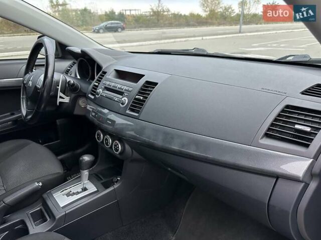 Чорний Міцубісі Lancer, об'ємом двигуна 2 л та пробігом 199 тис. км за 7900 $, фото 17 на Automoto.ua