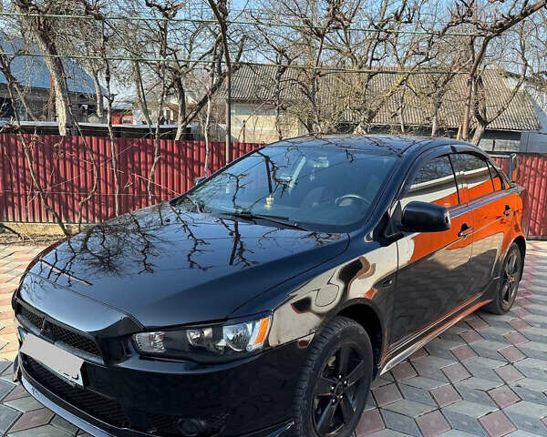 Чорний Міцубісі Lancer, об'ємом двигуна 2 л та пробігом 150 тис. км за 6500 $, фото 6 на Automoto.ua