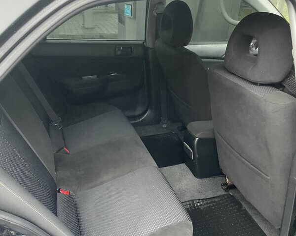 Черный Мицубиси Лансер, объемом двигателя 1.58 л и пробегом 214 тыс. км за 4400 $, фото 17 на Automoto.ua