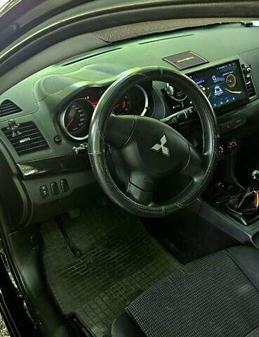 Черный Мицубиси Лансер, объемом двигателя 1.5 л и пробегом 205 тыс. км за 6300 $, фото 16 на Automoto.ua