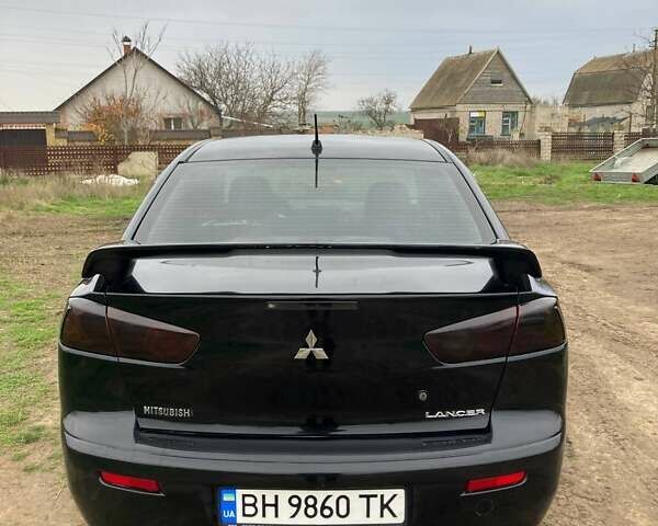 Чорний Міцубісі Lancer, об'ємом двигуна 2 л та пробігом 180 тис. км за 7500 $, фото 2 на Automoto.ua