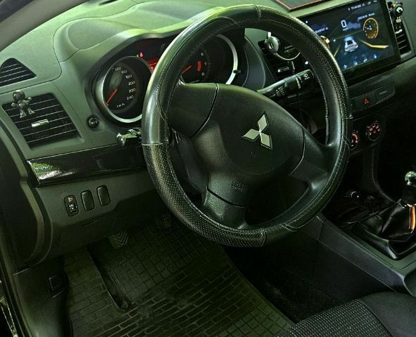 Чорний Міцубісі Lancer, об'ємом двигуна 1.5 л та пробігом 205 тис. км за 6300 $, фото 16 на Automoto.ua