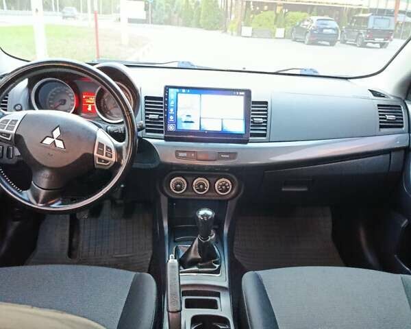 Мицубиси Лансер 2008 в Днепре (Днепропетровске) на Automoto.ua Черный Мицубиси Лансер, объемом двигателя 2 л и пробегом 196 тыс. км за 6900 $, фото 28 на Automoto.ua
