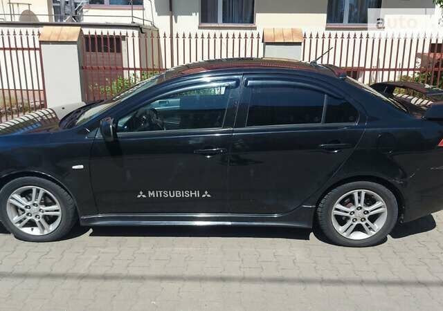 Чорний Міцубісі Lancer, об'ємом двигуна 2 л та пробігом 257 тис. км за 5500 $, фото 5 на Automoto.ua