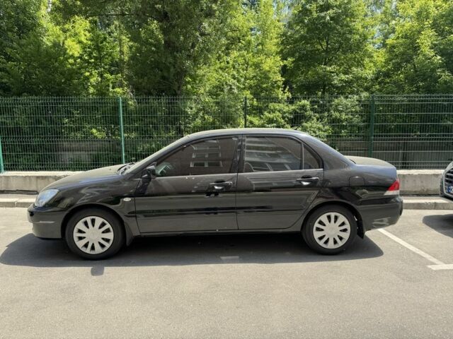 Чорний Міцубісі Lancer, об'ємом двигуна 1.6 л та пробігом 78 тис. км за 3999 $, фото 2 на Automoto.ua