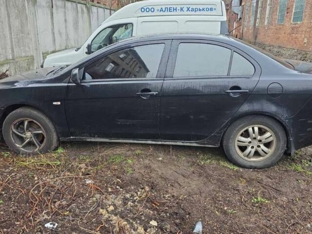 Черный Мицубиси Лансер, объемом двигателя 1.5 л и пробегом 300 тыс. км за 2500 $, фото 5 на Automoto.ua