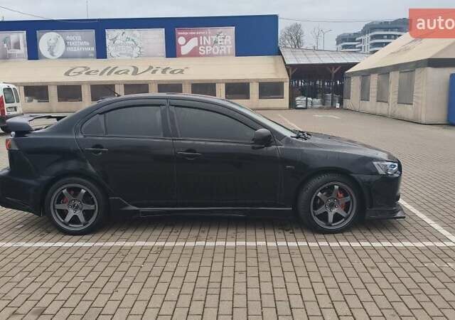 Чорний Міцубісі Lancer, об'ємом двигуна 2 л та пробігом 160 тис. км за 8000 $, фото 2 на Automoto.ua