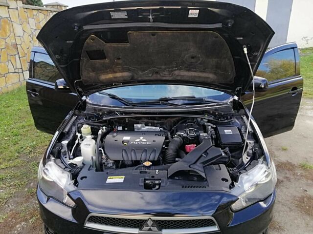 Міцубісі Lancer 2008 у Києві на Automoto.ua Чорний Міцубісі Lancer, об'ємом двигуна 2 л та пробігом 196 тис. км за 5500 $, фото 23 на Automoto.ua