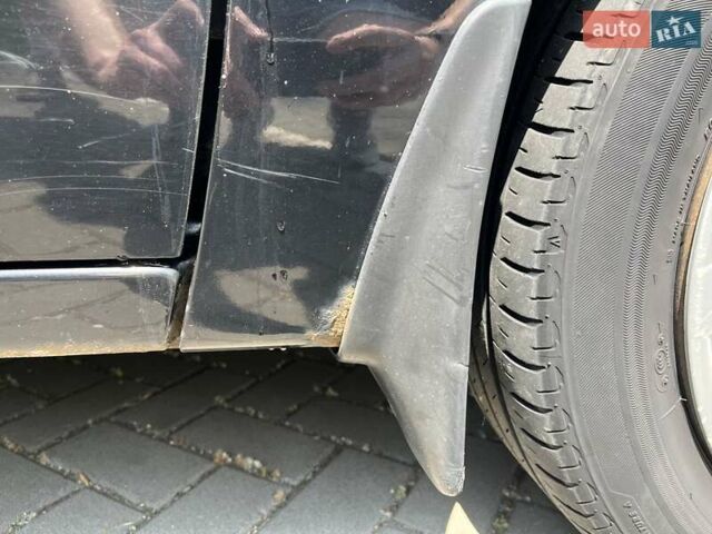 Чорний Міцубісі Lancer, об'ємом двигуна 1.6 л та пробігом 296 тис. км за 4200 $, фото 16 на Automoto.ua