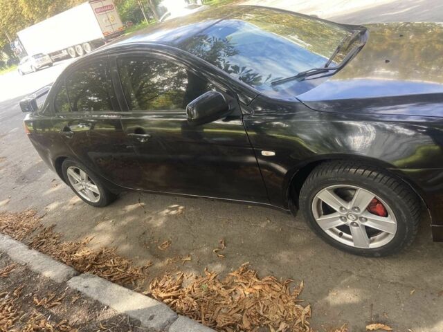 Чорний Міцубісі Lancer, об'ємом двигуна 1.5 л та пробігом 294 тис. км за 4800 $, фото 5 на Automoto.ua