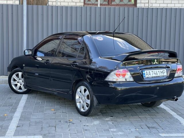 Міцубісі Lancer 2008 у Синельниковом на Automoto.ua Чорний Міцубісі Lancer, об'ємом двигуна 1.6 л та пробігом 230 тис. км за 4500 $, фото 7 на Automoto.ua