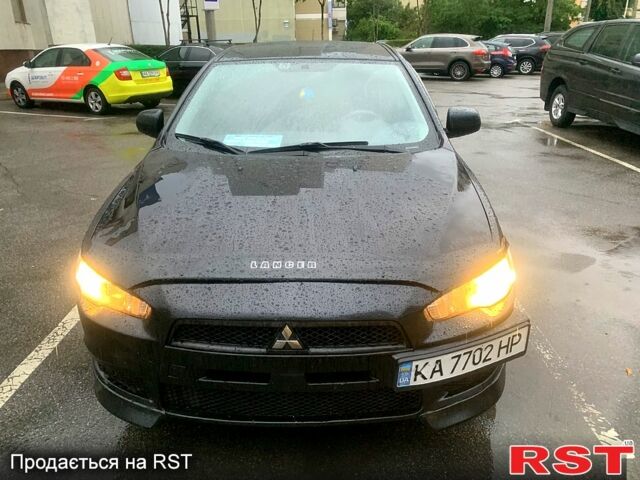 Черный Мицубиси Лансер, объемом двигателя 1.5 л и пробегом 250 тыс. км за 3800 $, фото 1 на Automoto.ua