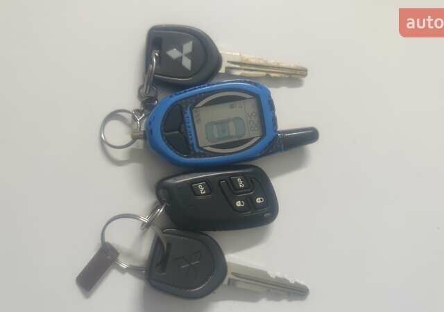 Чорний Міцубісі Lancer, об'ємом двигуна 1.6 л та пробігом 300 тис. км за 5500 $, фото 11 на Automoto.ua