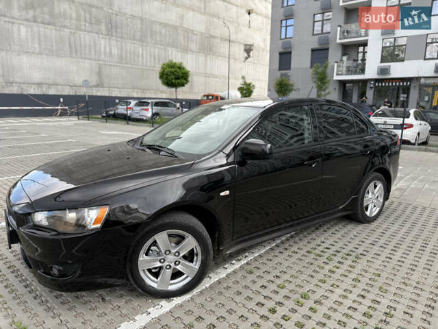 Чорний Міцубісі Lancer, об'ємом двигуна 2 л та пробігом 220 тис. км за 5850 $, фото 3 на Automoto.ua