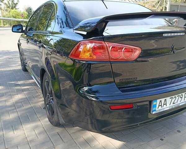 Мицубиси Лансер 2008 в Днепре (Днепропетровске) на Automoto.ua Черный Мицубиси Лансер, объемом двигателя 2 л и пробегом 196 тыс. км за 6900 $, фото 17 на Automoto.ua