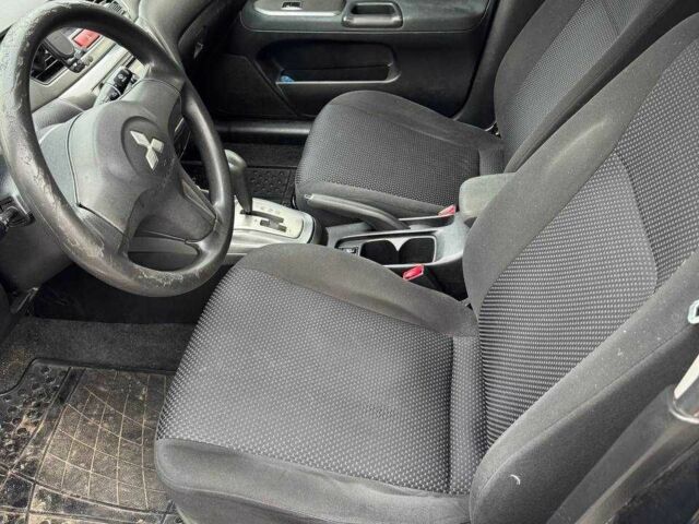 Чорний Міцубісі Lancer, об'ємом двигуна 1.6 л та пробігом 245 тис. км за 4500 $, фото 15 на Automoto.ua