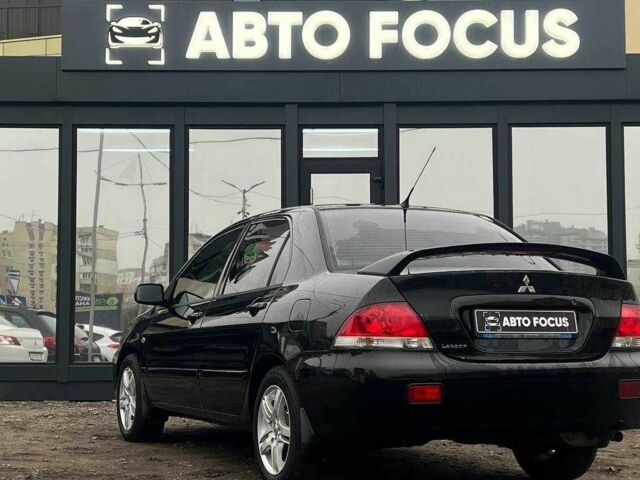Чорний Міцубісі Lancer, об'ємом двигуна 0 л та пробігом 340 тис. км за 6190 $, фото 4 на Automoto.ua