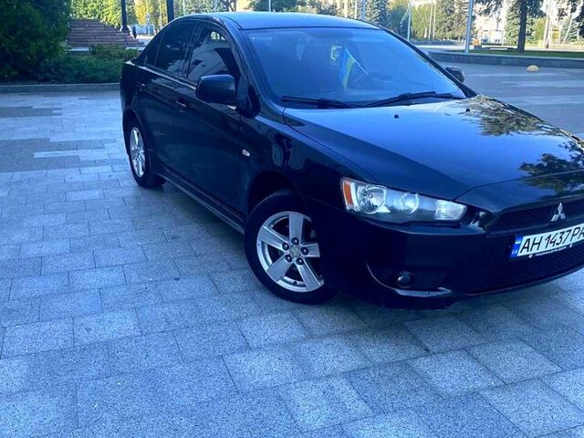 Чорний Міцубісі Lancer, об'ємом двигуна 2 л та пробігом 220 тис. км за 6300 $, фото 2 на Automoto.ua