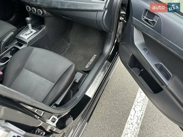Чорний Міцубісі Lancer, об'ємом двигуна 2 л та пробігом 199 тис. км за 7900 $, фото 20 на Automoto.ua