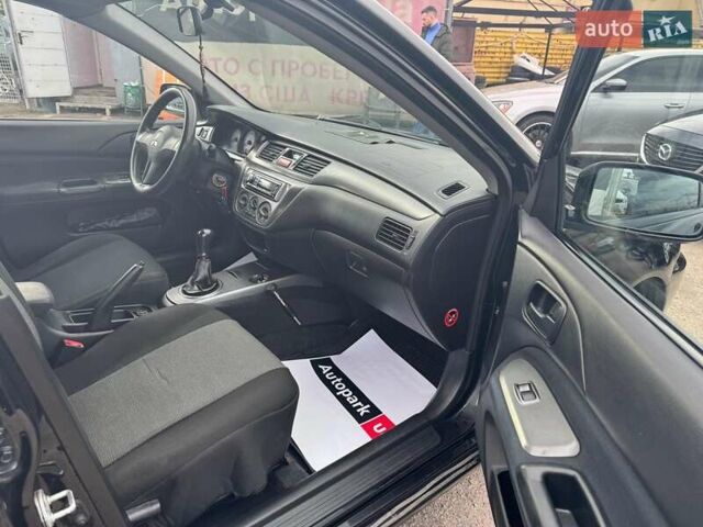 Мицубиси Лансер 2008 в Запорожье на Automoto.ua Черный Мицубиси Лансер, объемом двигателя 1.6 л и пробегом 316 тыс. км за 4290 $, фото 13 на Automoto.ua