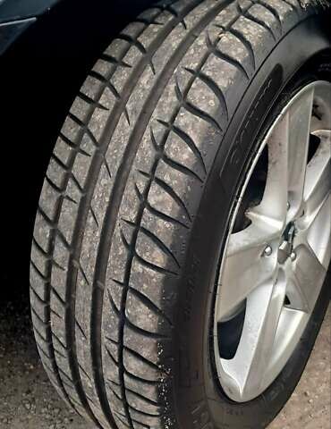 Черный Мицубиси Лансер, объемом двигателя 2 л и пробегом 211 тыс. км за 6900 $, фото 12 на Automoto.ua