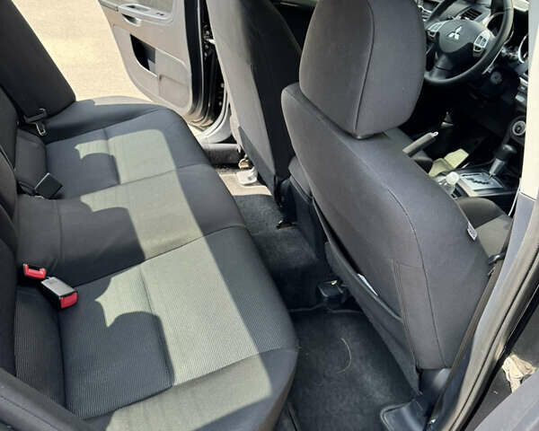 Чорний Міцубісі Lancer, об'ємом двигуна 2 л та пробігом 217 тис. км за 7800 $, фото 33 на Automoto.ua
