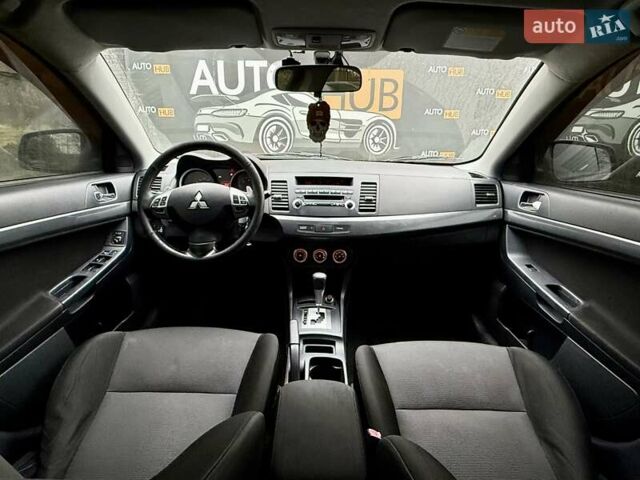 Чорний Міцубісі Lancer, об'ємом двигуна 2 л та пробігом 118 тис. км за 6200 $, фото 11 на Automoto.ua