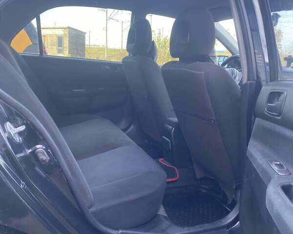 Мицубиси Лансер 2008 в Киеве на Automoto.ua Черный Мицубиси Лансер, объемом двигателя 1.6 л и пробегом 72 тыс. км за 2650 $, фото 10 на Automoto.ua