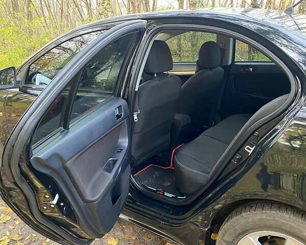 Чорний Міцубісі Lancer, об'ємом двигуна 2 л та пробігом 237 тис. км за 7500 $, фото 3 на Automoto.ua