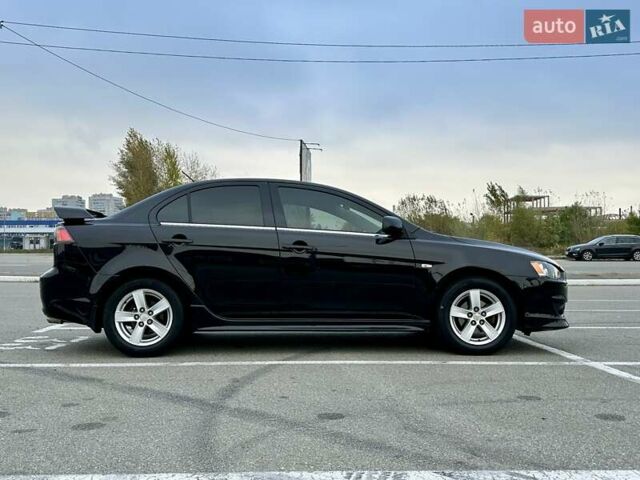 Чорний Міцубісі Lancer, об'ємом двигуна 2 л та пробігом 199 тис. км за 7900 $, фото 2 на Automoto.ua
