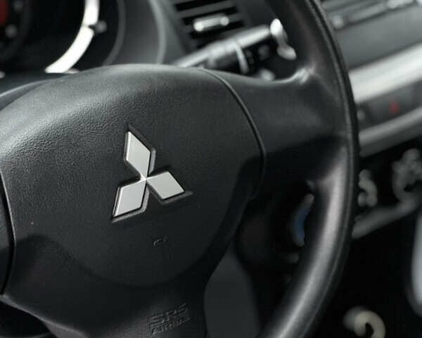 Чорний Міцубісі Lancer, об'ємом двигуна 1.5 л та пробігом 111 тис. км за 6999 $, фото 39 на Automoto.ua