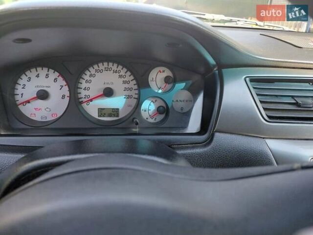 Чорний Міцубісі Lancer, об'ємом двигуна 1.6 л та пробігом 221 тис. км за 5200 $, фото 4 на Automoto.ua