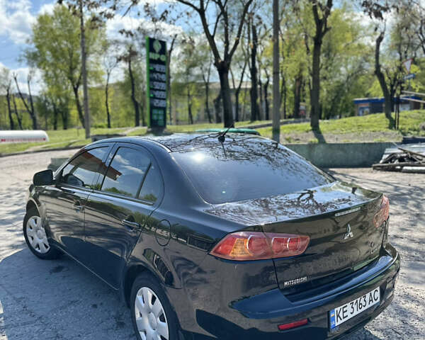 Черный Мицубиси Лансер, объемом двигателя 1.5 л и пробегом 180 тыс. км за 6200 $, фото 3 на Automoto.ua