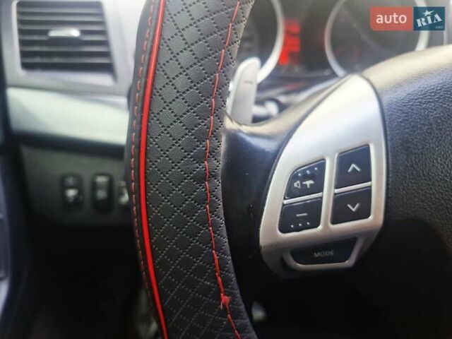 Чорний Міцубісі Lancer, об'ємом двигуна 2 л та пробігом 240 тис. км за 7850 $, фото 28 на Automoto.ua
