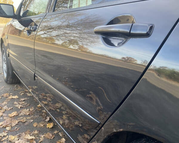 Мицубиси Лансер 2008 в Киеве на Automoto.ua Черный Мицубиси Лансер, объемом двигателя 1.6 л и пробегом 72 тыс. км за 2650 $, фото 5 на Automoto.ua