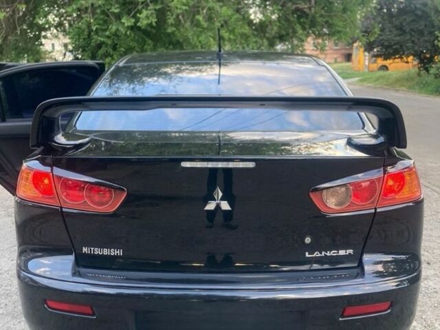 Чорний Міцубісі Lancer, об'ємом двигуна 1.5 л та пробігом 217 тис. км за 6000 $, фото 4 на Automoto.ua
