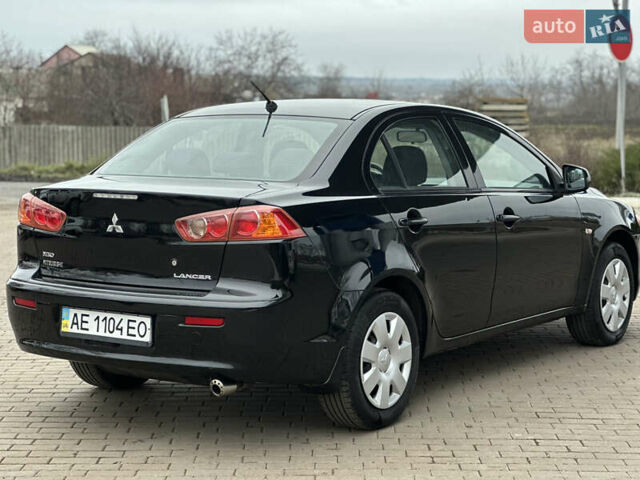 Чорний Міцубісі Lancer, об'ємом двигуна 1.5 л та пробігом 111 тис. км за 6999 $, фото 8 на Automoto.ua