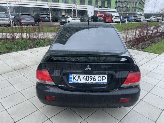 Черный Мицубиси Лансер, объемом двигателя 1.6 л и пробегом 226 тыс. км за 3750 $, фото 3 на Automoto.ua