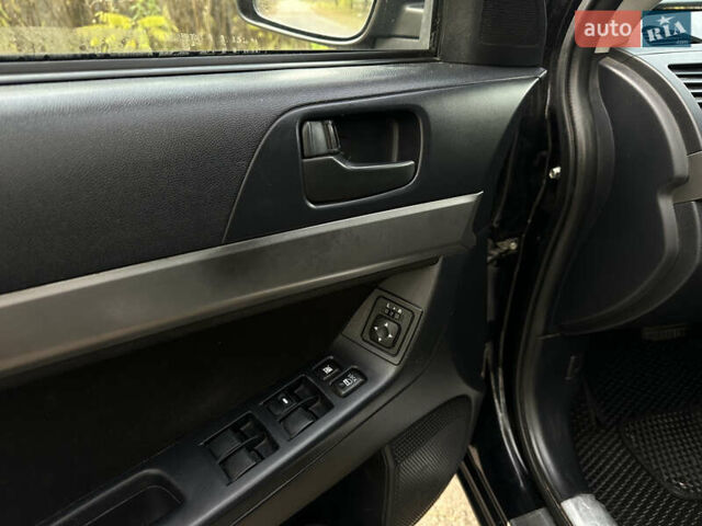 Черный Мицубиси Лансер, объемом двигателя 1.5 л и пробегом 285 тыс. км за 4800 $, фото 18 на Automoto.ua