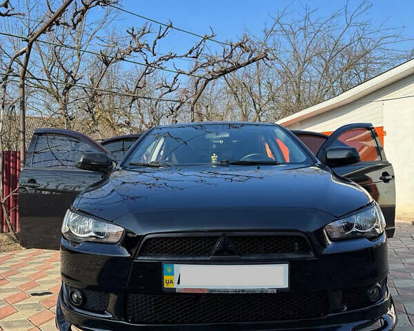 Чорний Міцубісі Lancer, об'ємом двигуна 2 л та пробігом 150 тис. км за 6500 $, фото 2 на Automoto.ua