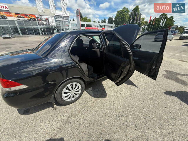 Чорний Міцубісі Lancer, об'ємом двигуна 1.6 л та пробігом 292 тис. км за 3600 $, фото 14 на Automoto.ua